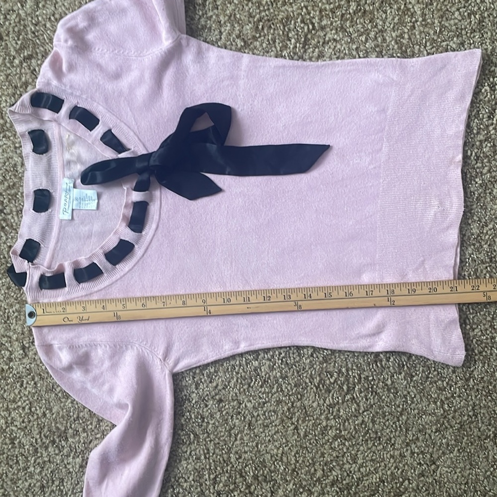 Pink sweater with black tie along neckline - Picture 8 of 11